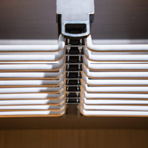 Top mounted trouser rack
